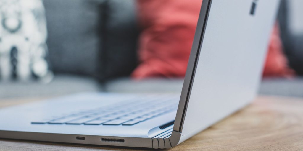 Open Windows Laptop On Wooden Table.jpg