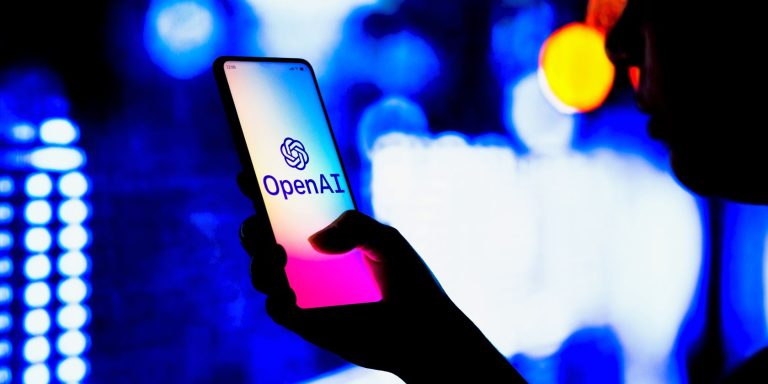 Openai Logo On Smartphone Being Held Feature.jpg