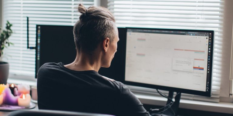 A Man In Front Of His Computer.jpg