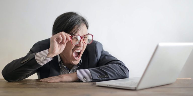 A Woman Yelling At Her Laptop.jpg