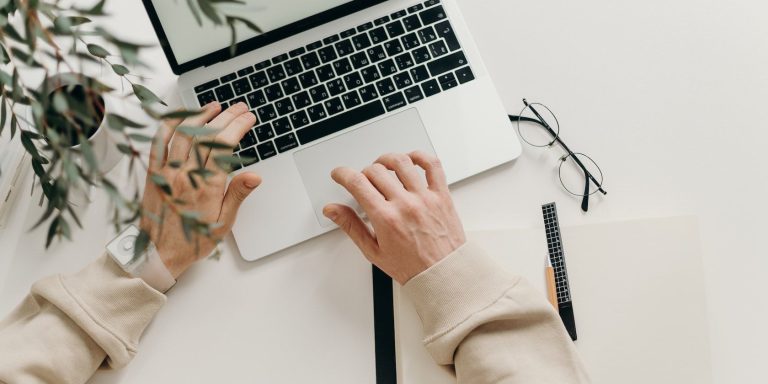 Image Showing A Pair Of Hands Working On A Computer 1.jpg